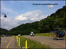 Three air ambulances landing on US50 during a large incident.